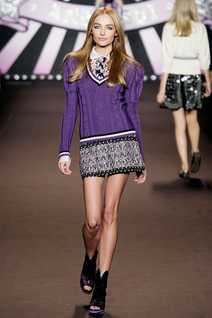 purple fitted sweater with mini skirt