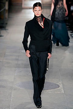 black tailored blazer and slim pants