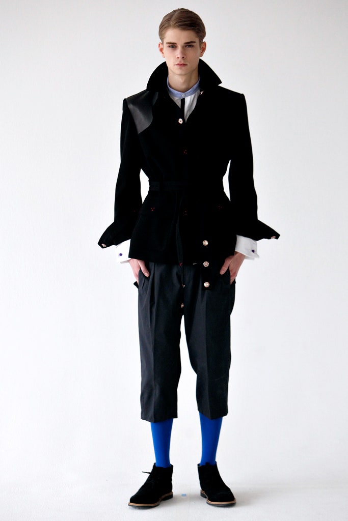 black structured jacket with gray pants