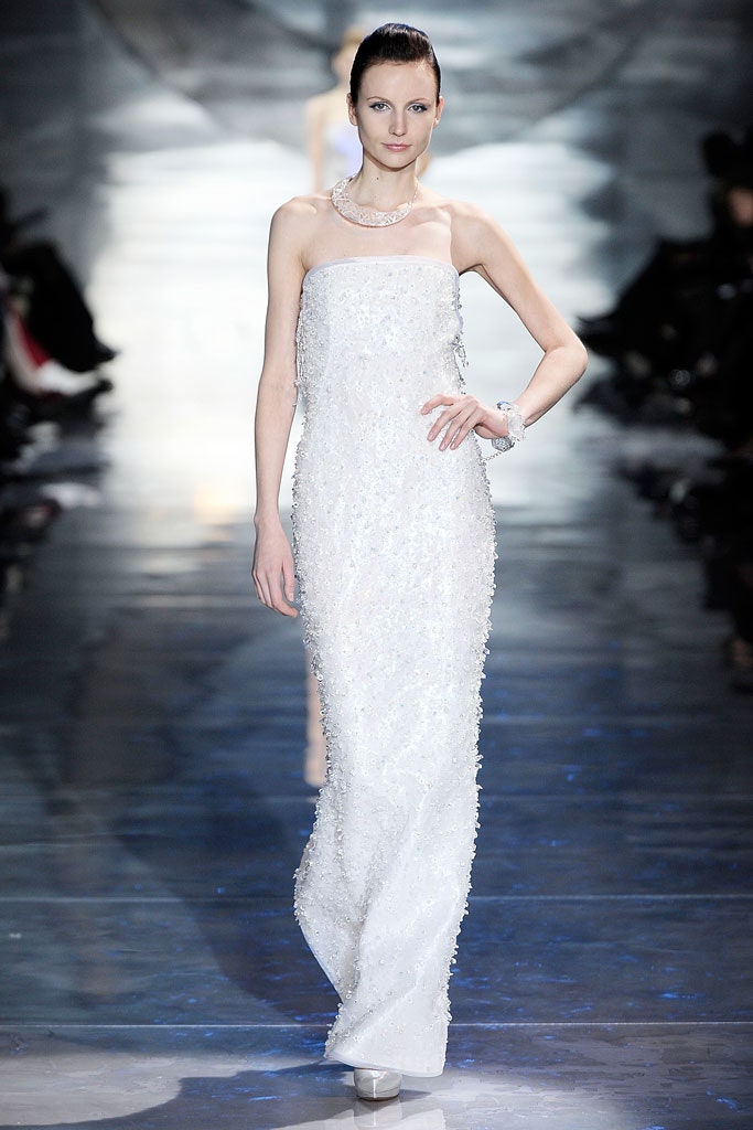 white beaded strapless gown
