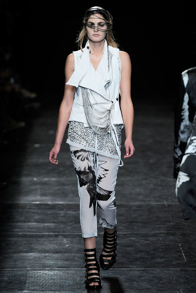 white fitted top with gray printed pants
