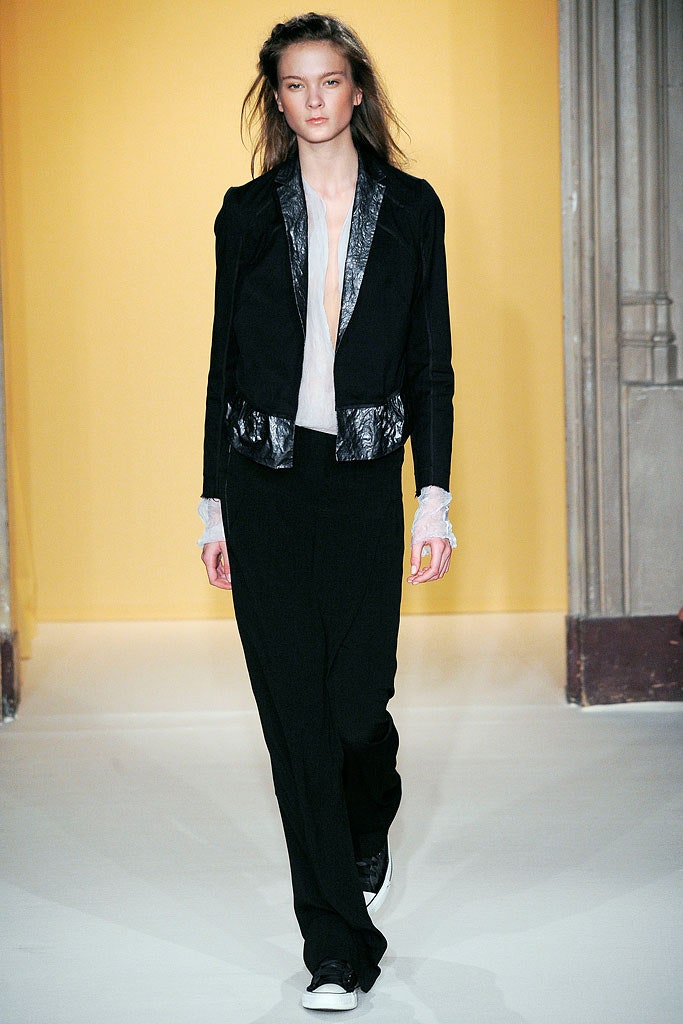 black fitted jacket with relaxed pants