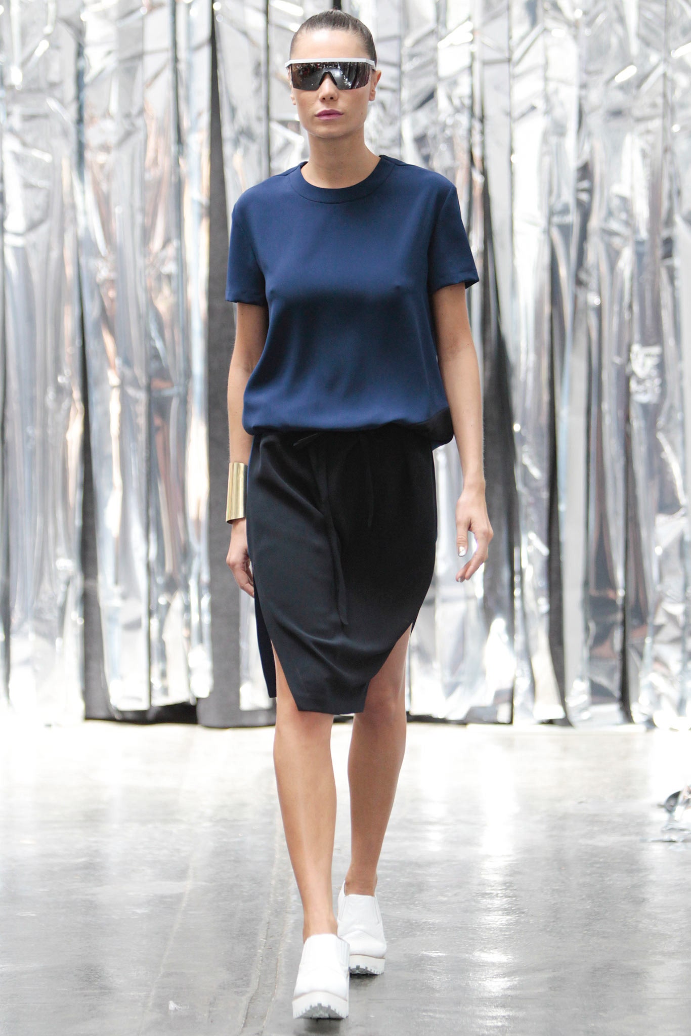 blue relaxed top with black skirt