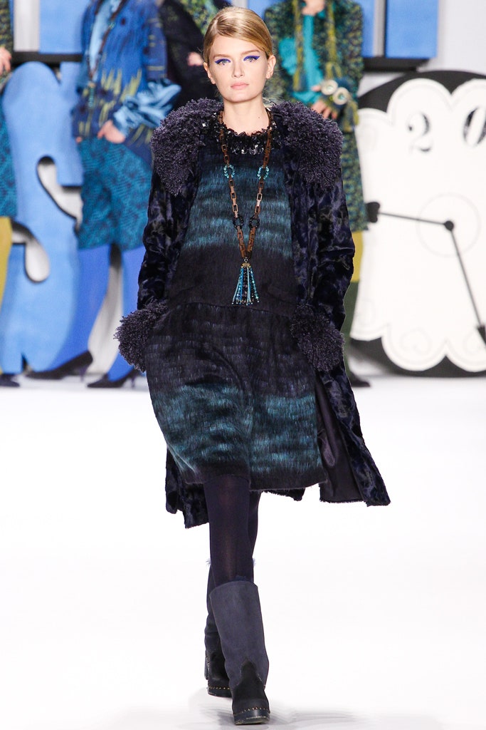 black fur coat with tiered dress