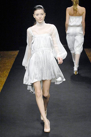 white silk sleeveless dress