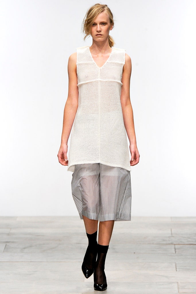 white sleeveless knit tunic top
