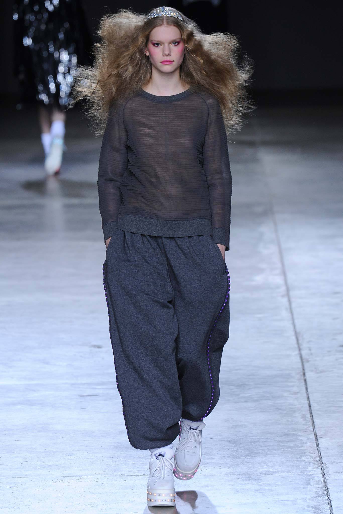 black sheer top gray wide-leg pants