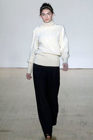white wool long-sleeve turtleneck relaxed textured sweater