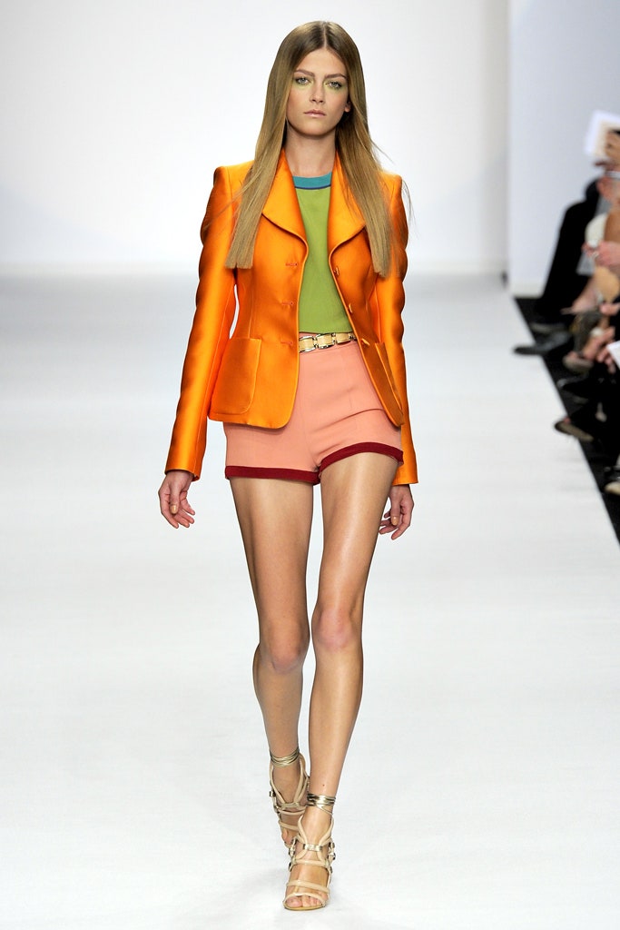 orange blazer green top pink shorts