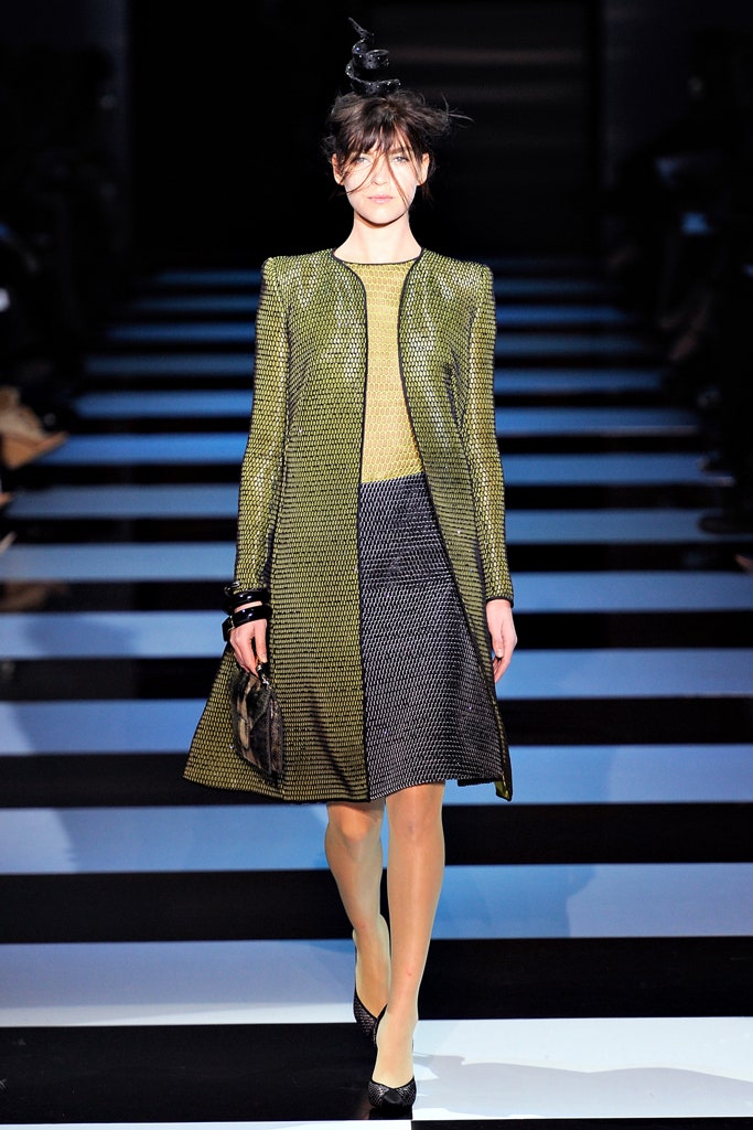 fitted green silk coat and black skirt