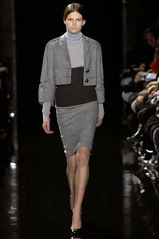 gray fitted jacket with black pencil skirt