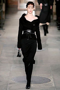 black fitted midi dress and coat