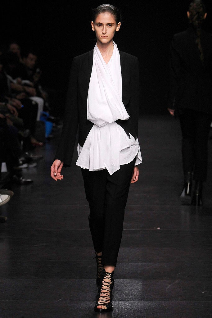 black tailored blazer with white top