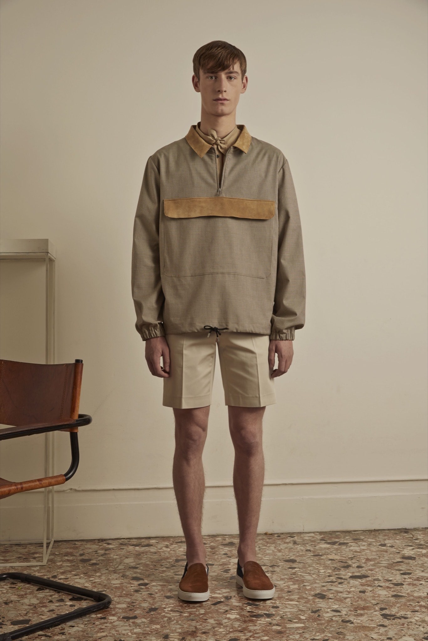 beige jacket with white shorts
