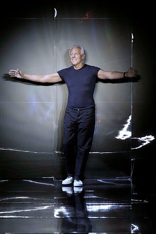 black fitted t-shirt and tailored pants