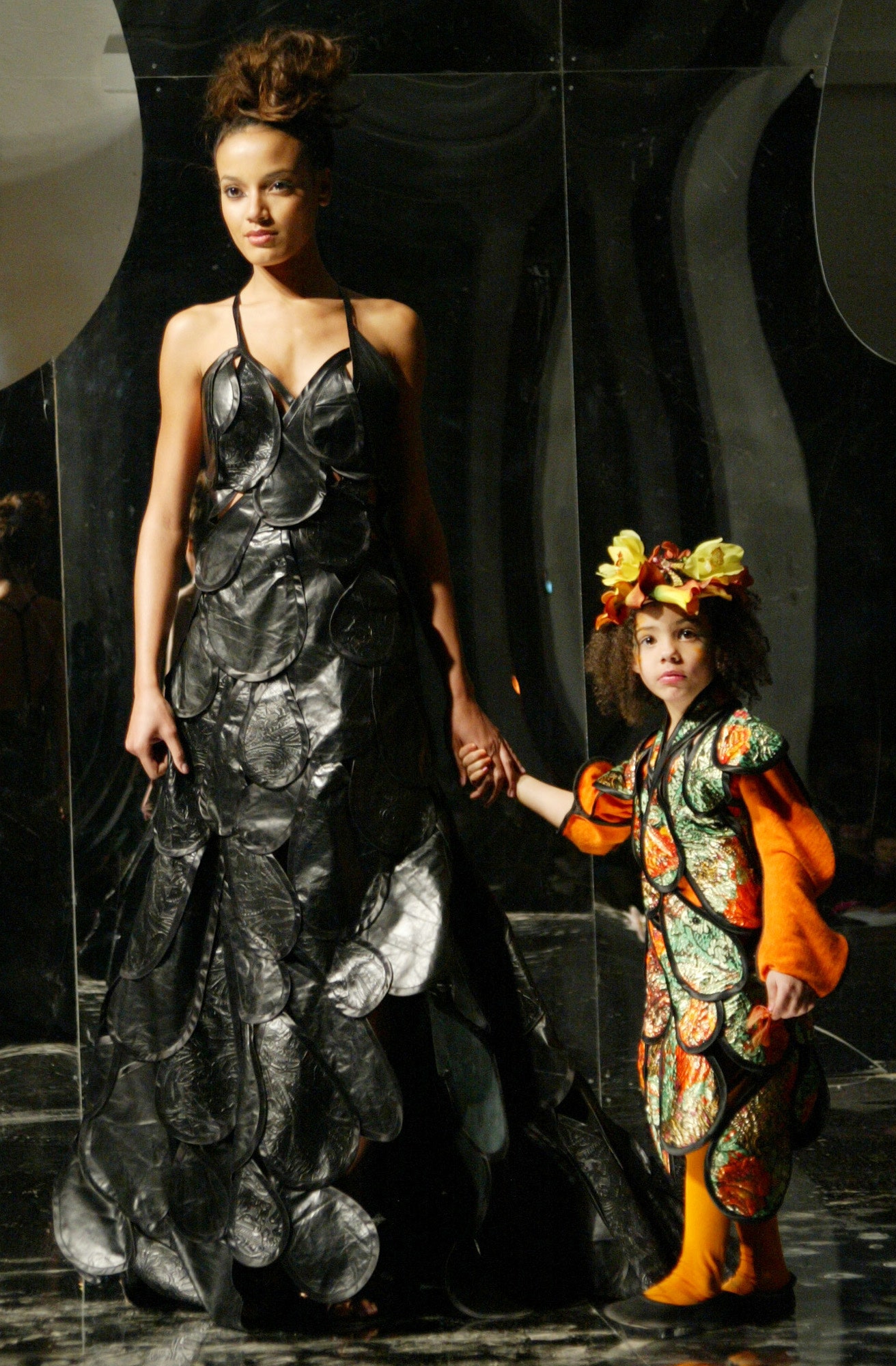 black leather gown and colorful dress