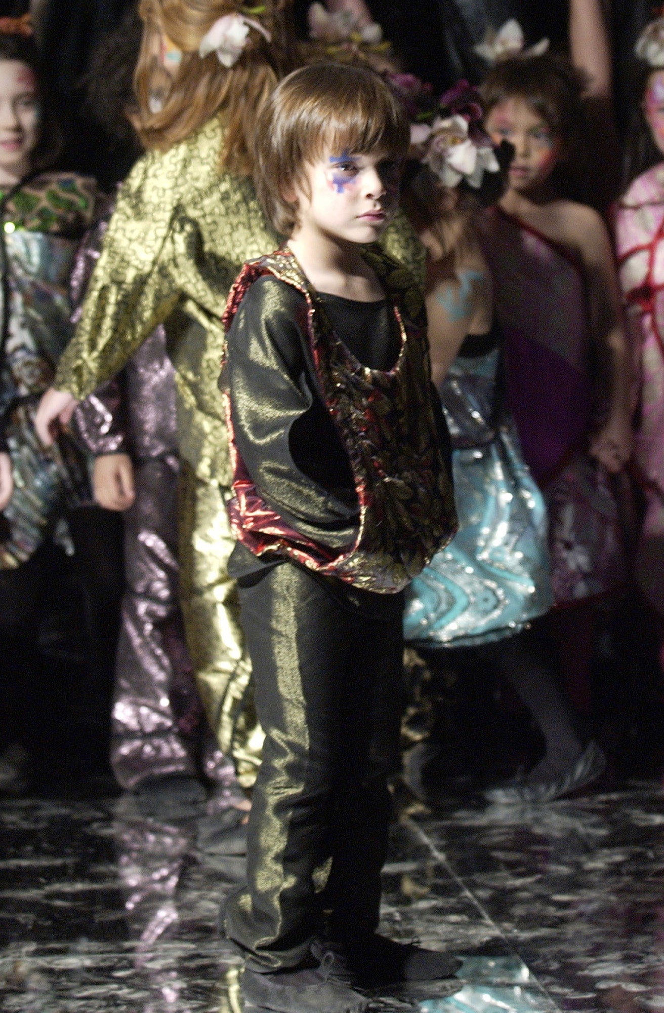 black and gold fitted pants with layered top