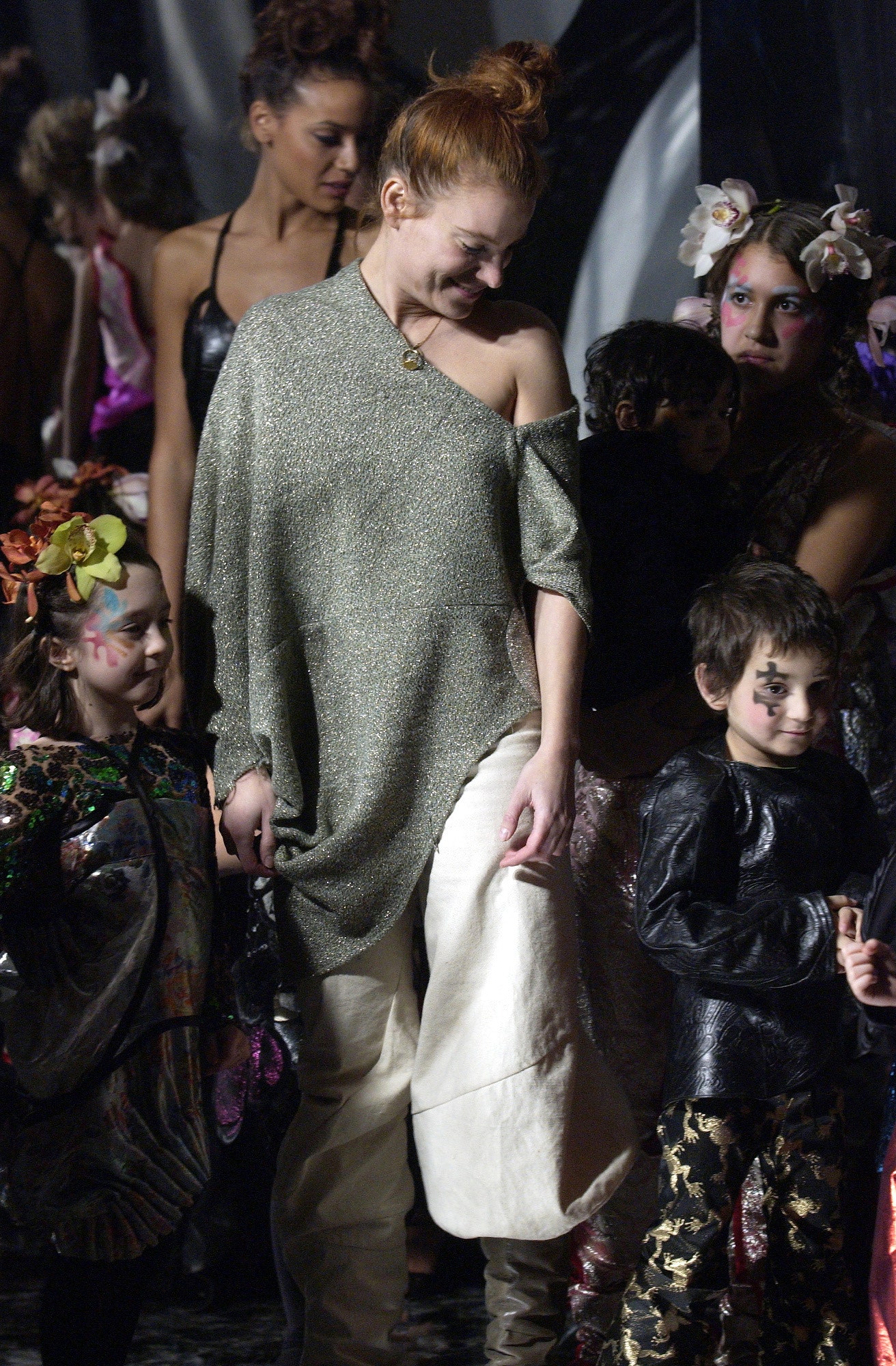 gray off-shoulder top with white wide-leg pants