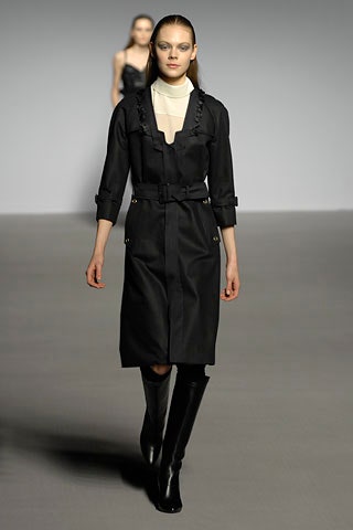 black fitted coat with belt