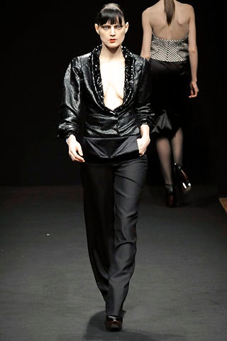 fitted black silk blazer and tailored pants