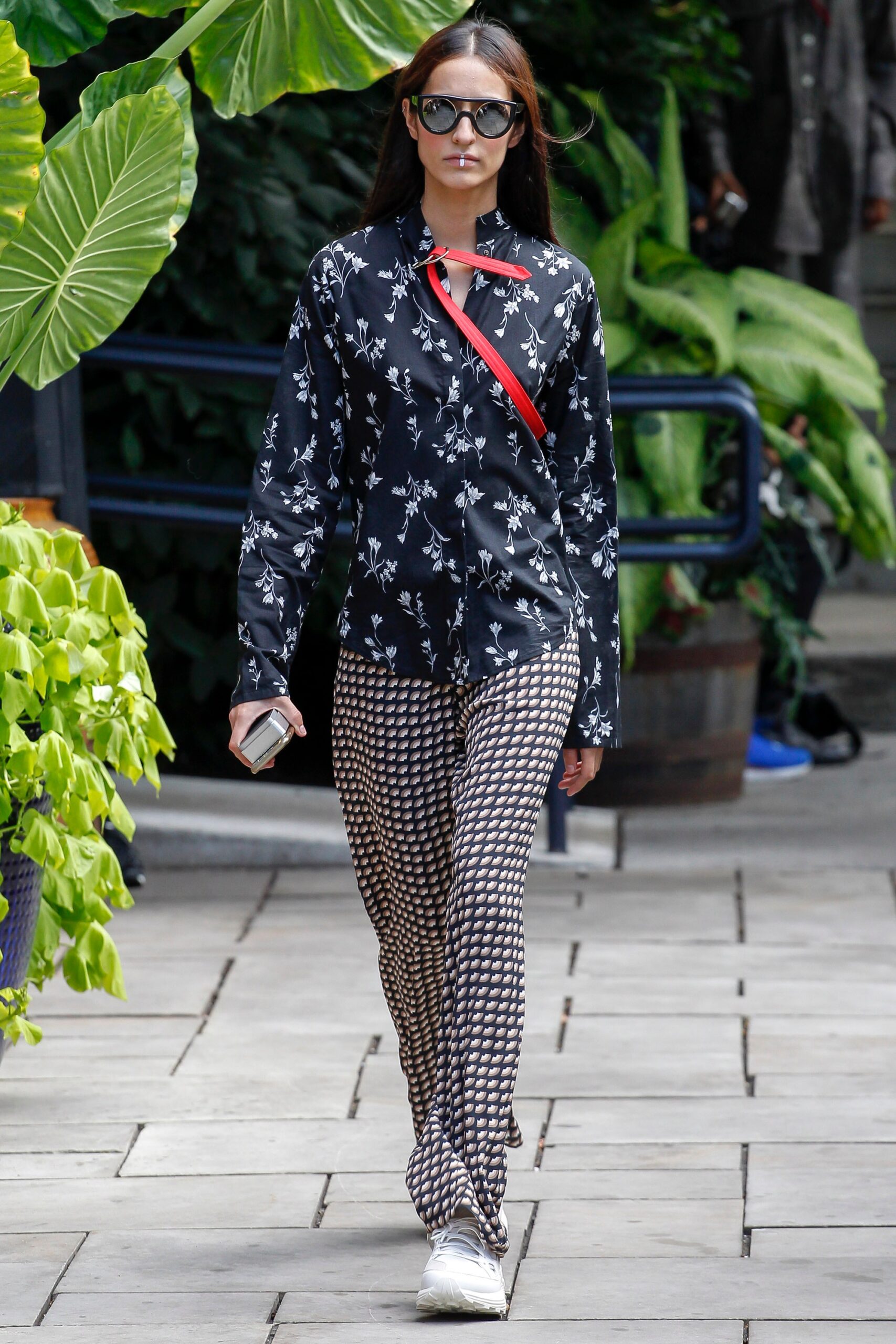 black printed shirt with brown pants