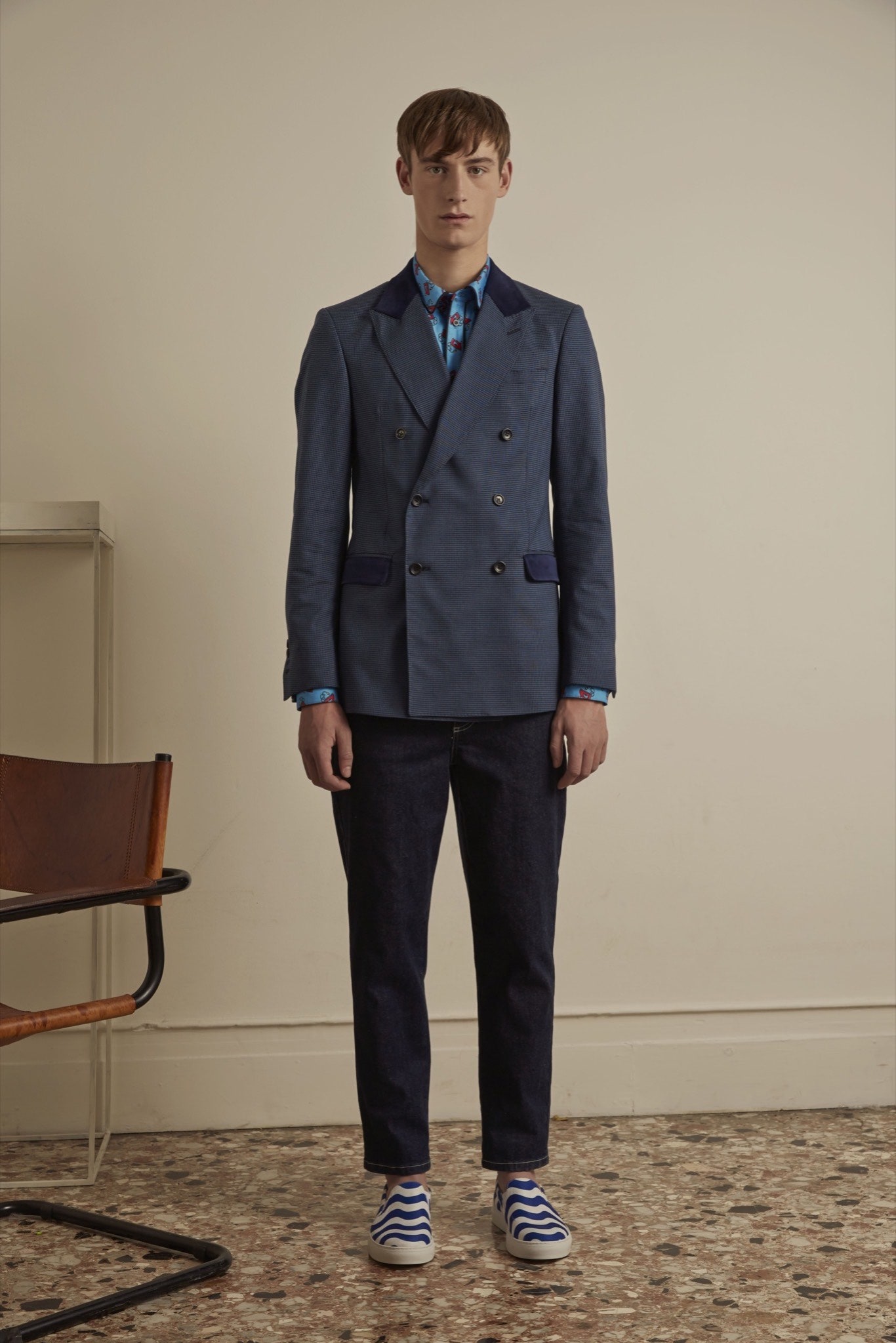 blue tailored blazer with denim pants