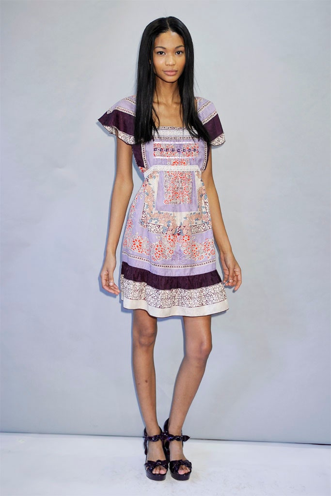 purple embroidered mini dress with strappy shoes