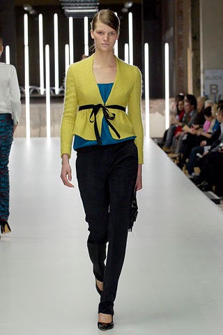 yellow cardigan blue top black pants