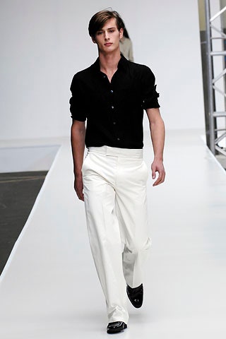 black fitted shirt and white tailored pants