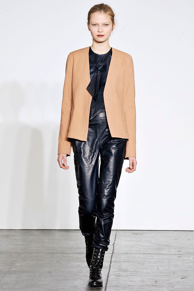 beige tailored blazer with black leather pants