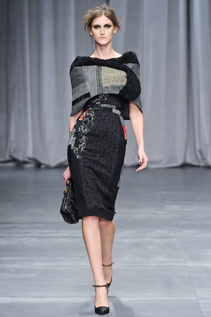 black fitted midi dress with gray cape