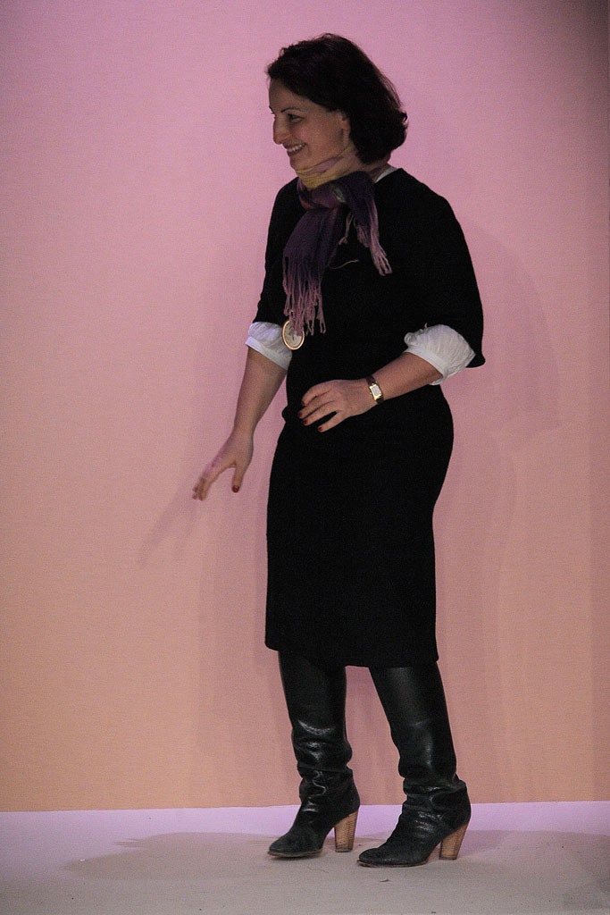 black fitted midi dress with boots