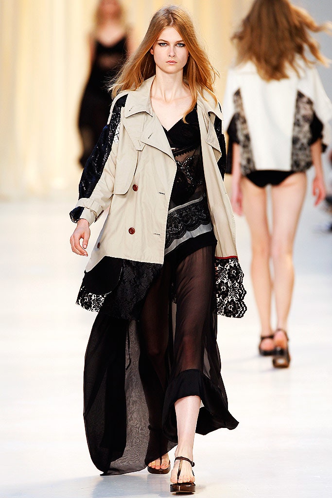 beige trench coat and black lace dress