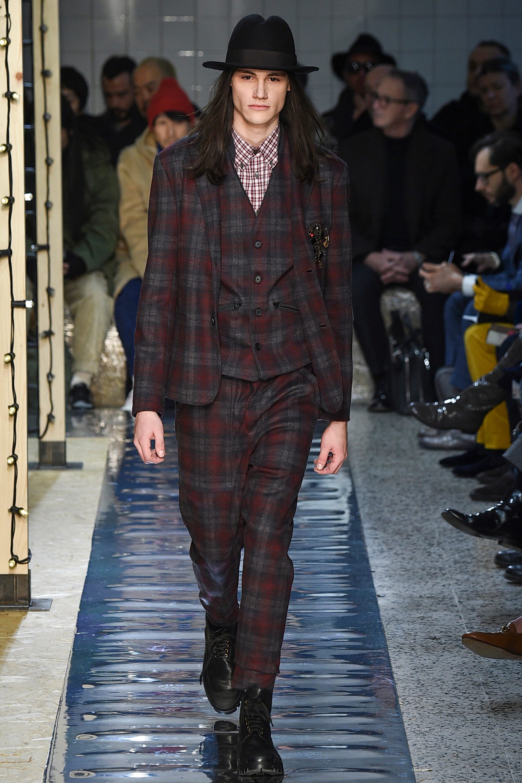 red and black checked suit