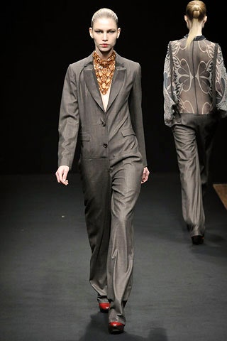 gray tailored suit with silk top