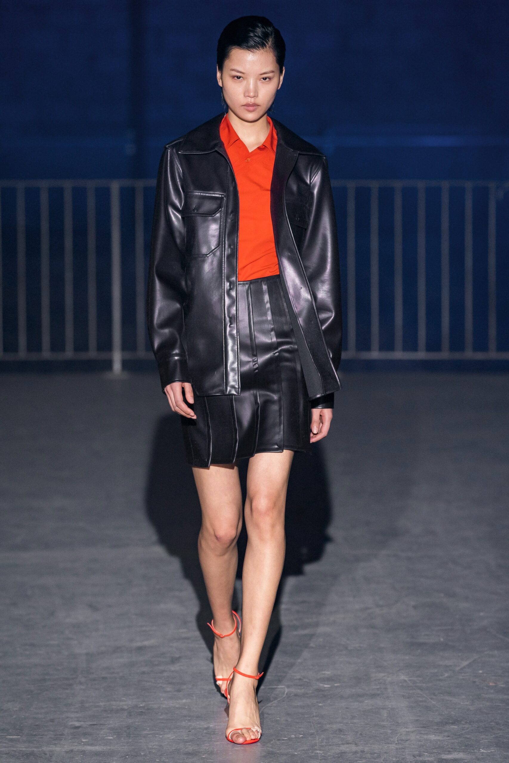 black leather jacket with red shirt