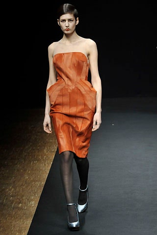 fitted orange leather strapless dress
