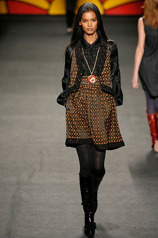 black and orange pleated dress