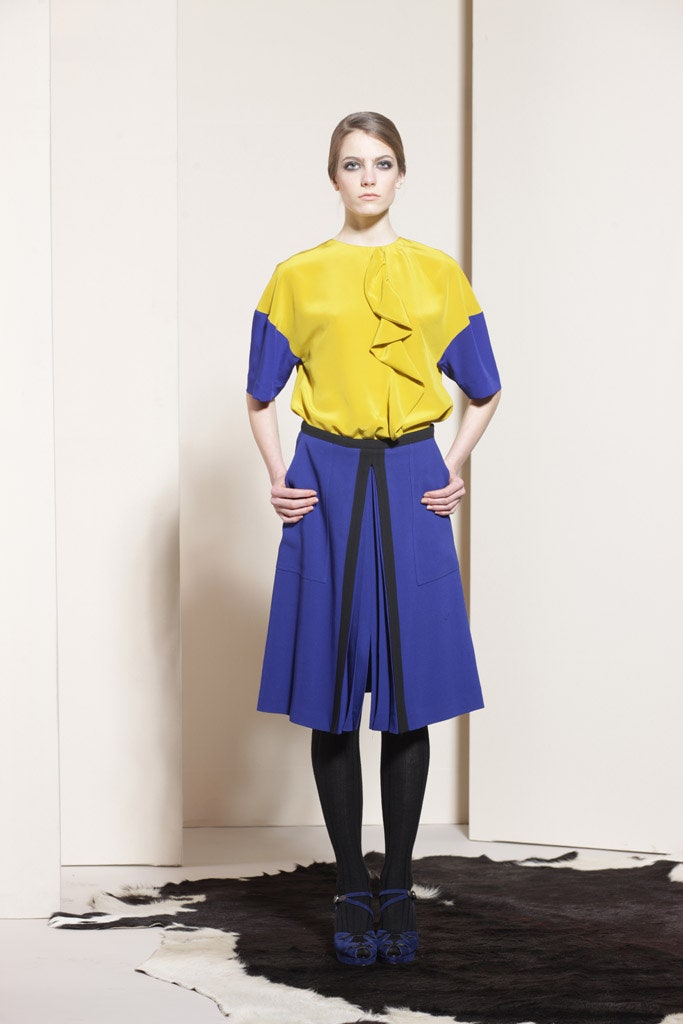 yellow blue ruffled top and pleated skirt