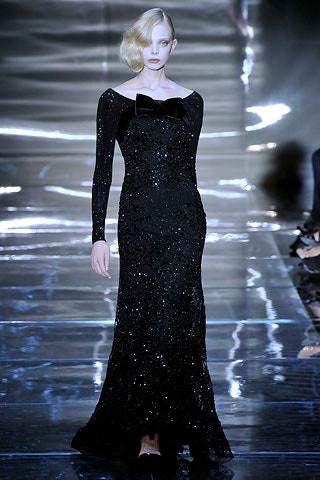 black sequined off-shoulder gown