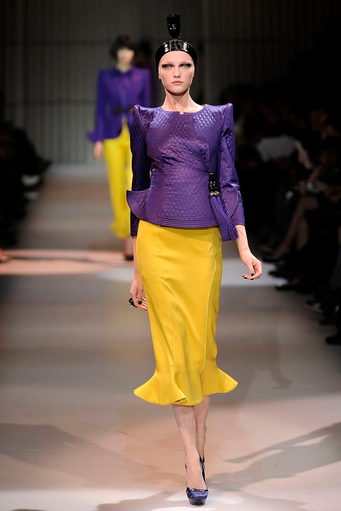 purple fitted top yellow flared skirt