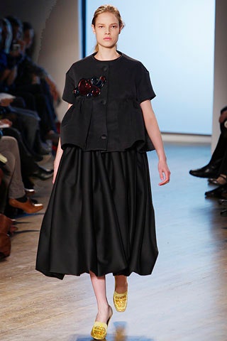 black top and midi skirt