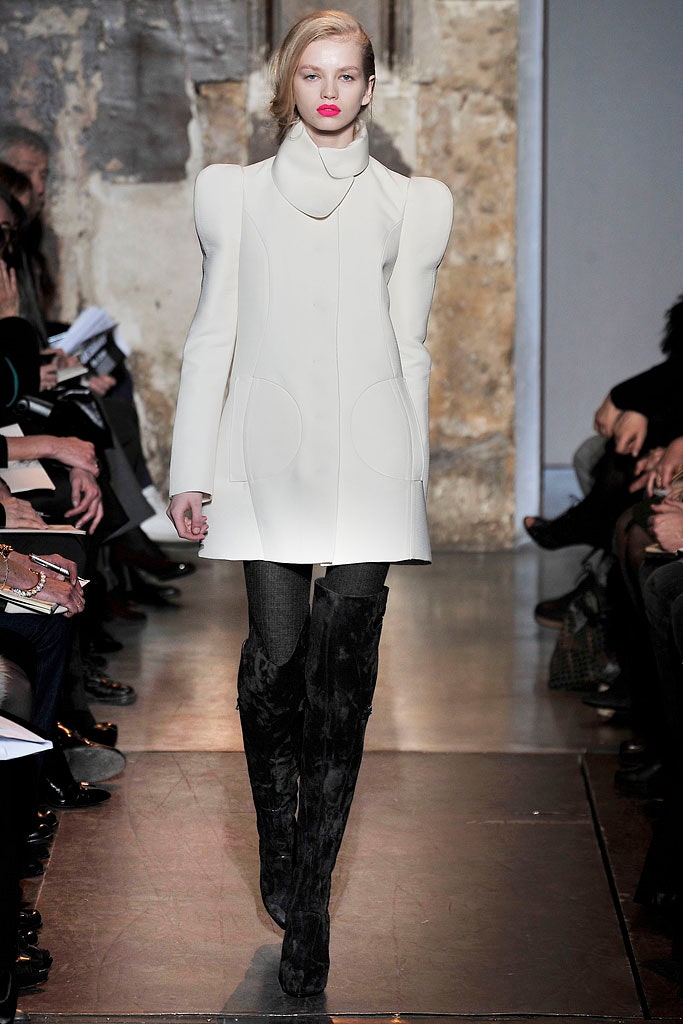 white structured coat with black boots