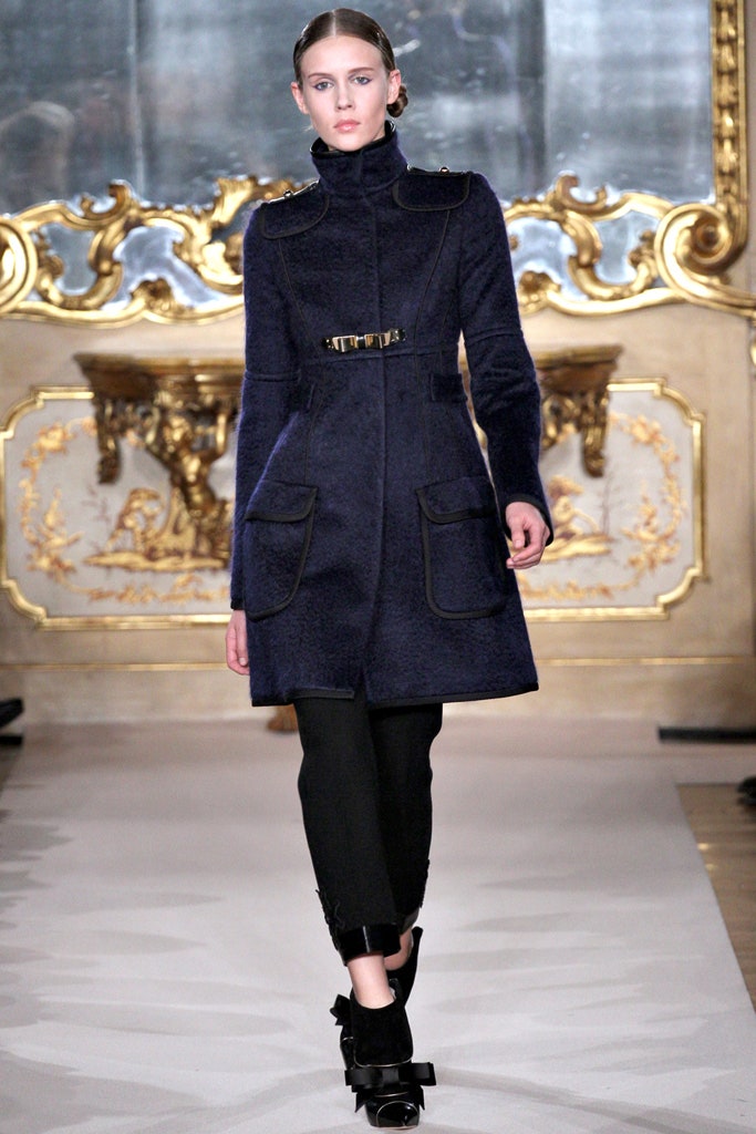 blue wool fitted coat with black tailored pants