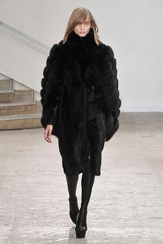 black fur coat with fitted pants
