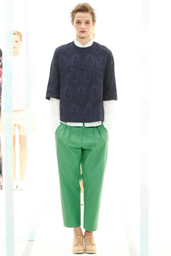 navy printed top with green pants