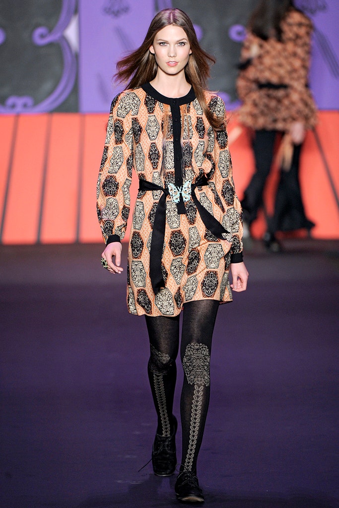 orange silk long-sleeve collared fitted printed belted dress