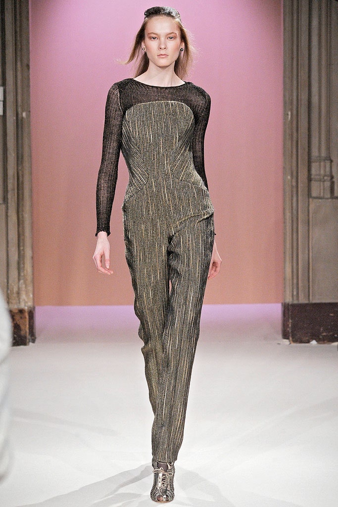 gold and black fitted catsuit