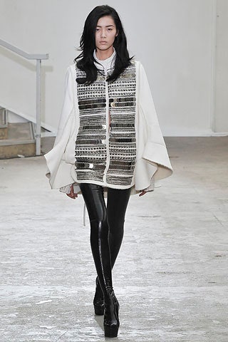 white silk relaxed coat and black leather pants