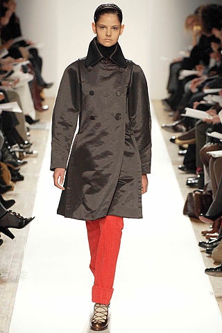 black silk fitted coat with red pants